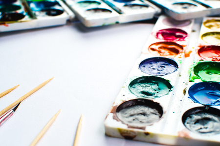 Paint lay on the black surface, pretty lights background, creativityの写真素材