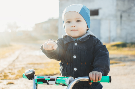 child on a bike, in the spring,cute little athleteの写真素材