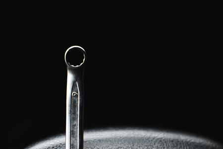 spanner chrome plated for a dark, almost black backgroundの写真素材