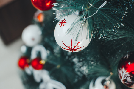 Christmas toys on the Christmas tree with a close angleの写真素材