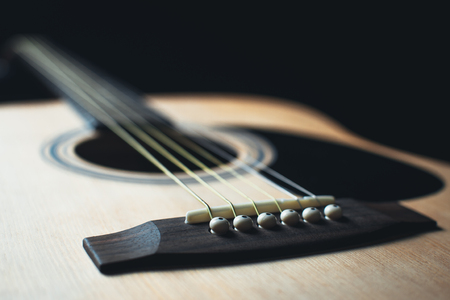 part of the guitar, neck, a grey and black background, beautifully, elegantly