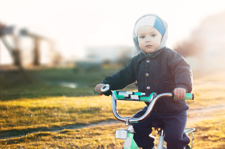 child on a bike, in the spring,cute little athleteの写真素材