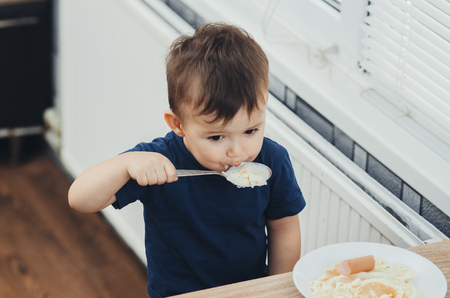little kid having his mealの写真素材