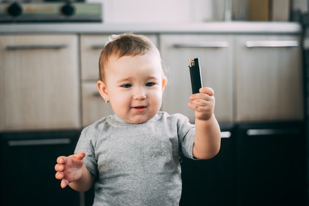 a child playing with a gas lighter is very dangerousの写真素材