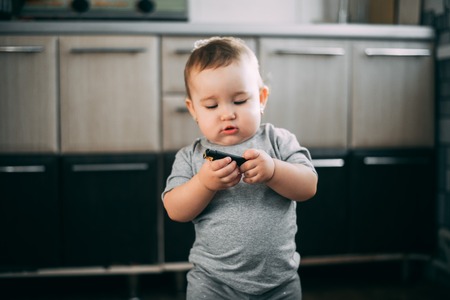 a child playing with a gas lighter is very dangerousの写真素材