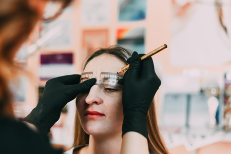 microbleeding eyebrow measurement and drawing of circuit paste, the architecture of the eyebrowsの写真素材