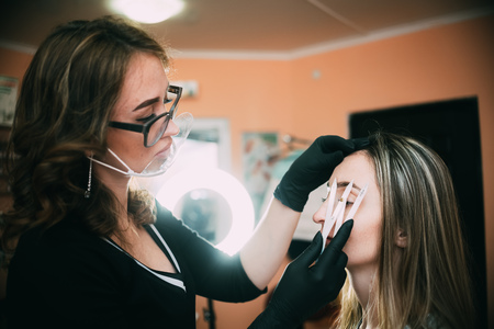 microbleeding eyebrow measurement and drawing of circuit paste, the architecture of the eyebrowsの写真素材