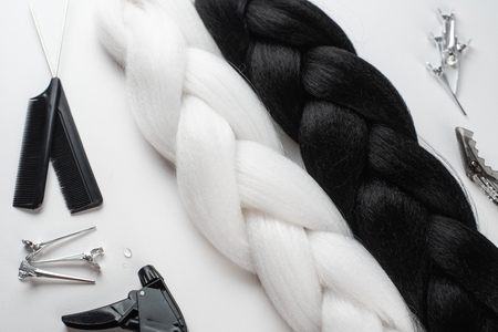 Kanekalon. Colored artificial strands of hair. Material for plaiting braidsの写真素材