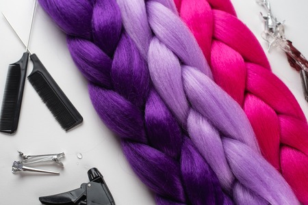 Kanekalon. Colored artificial strands of hair. Material for plaiting braidsの写真素材