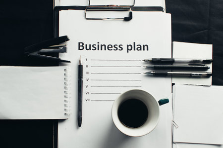 Workstation, a notebook with hand drawn business strategy