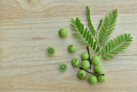 Indian gooseberry on a wooden floor. Top view.の写真素材
