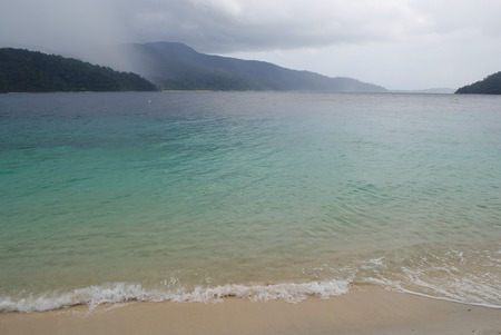 Raining on the beach at Lipe, Thailandの写真素材