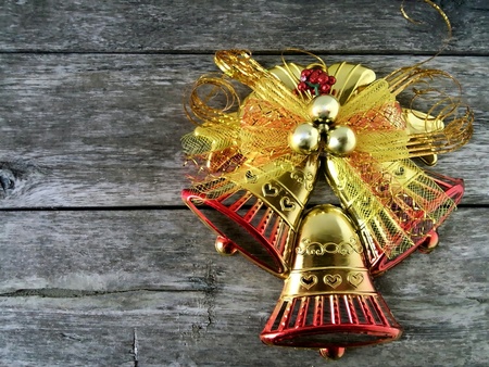 Christmas bells With a background old wood.の素材