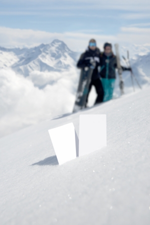 Blank lift pass in snow with people in backgroundの写真素材