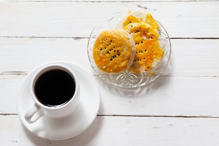 Coffee and Red bean cookies on wooden tableの写真素材
