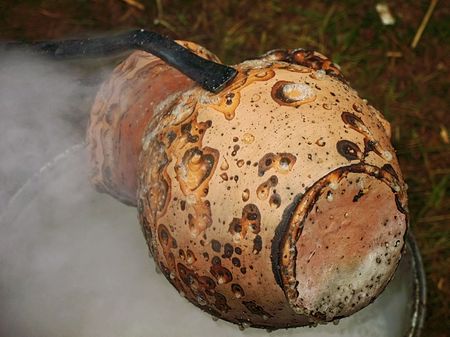 pitcher is coolled in special solution - its boiling bubble create drawing on jug