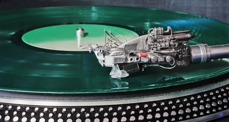 Fantastic vinyl phono cartridge on a green disc