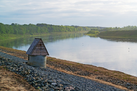 Preparation of the river coast for protection against a flood.The well on the river coast.の写真素材