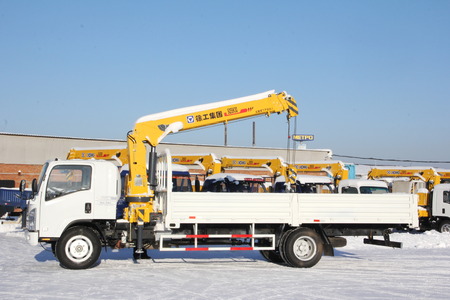 Great white auto truck crane standing on a construction site in winter - Russia, Crimea -January, 21, 2016のeditorial素材