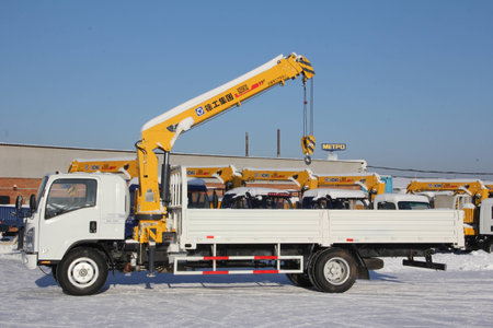 Great white auto truck crane standing on a construction site in winter - Russia, Crimea -January, 21, 2016のeditorial素材