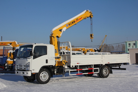 Great white auto truck crane standing on a construction site in winter - Russia, Crimea -January, 21, 2016のeditorial素材