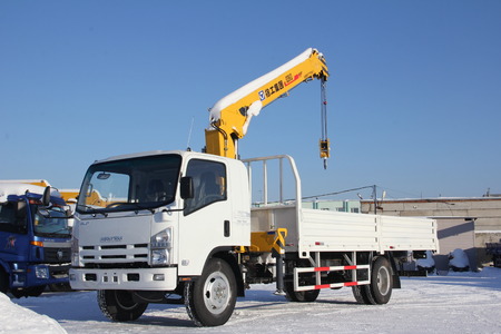 Great white auto truck crane standing on a construction site in winter - Russia, Crimea -January, 21, 2016のeditorial素材