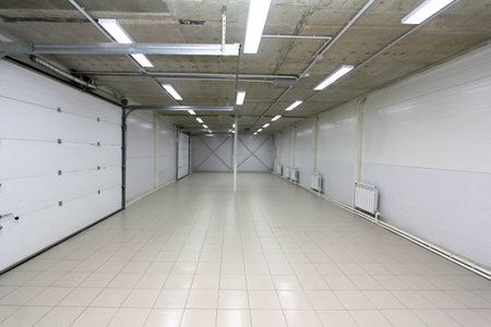 a Parking empty garage underground, warehouse interior with blank billboardの写真素材