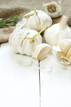 Fresh garlic on white deskの写真素材