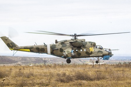 Military helicopter in the airの写真素材