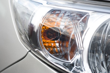 Closeup headlights . Modern car. Concept of expensive autoの写真素材