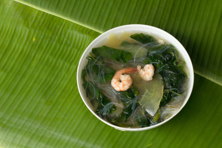 gaeng liang thai have Vegetables gourd papaya shrimp soup on Banana leaf greenの写真素材