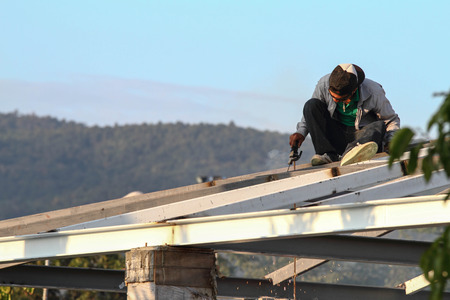 The construction workers doing the jobのeditorial素材