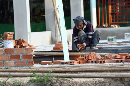 The construction workers doing the jobのeditorial素材