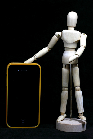 this is photo wood robot in action .の写真素材