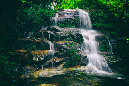 Vintage retro effect filtered hipster style image of tropical waterfall.の写真素材