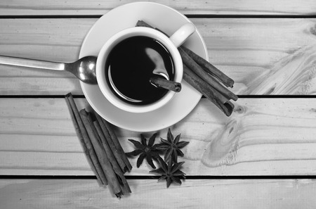 Glass of hot cinnamon espresso with effect back and white color.の写真素材