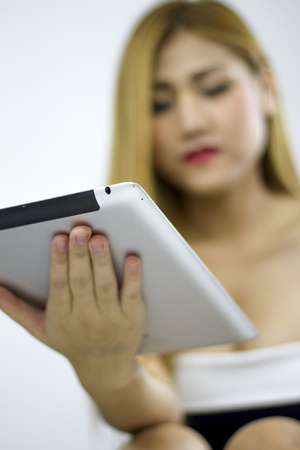 office girl with computer and use taplet.の写真素材