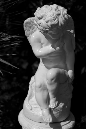 Cupid statue Photographed in black and white