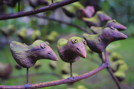 Bird statues of many clay lined.の写真素材
