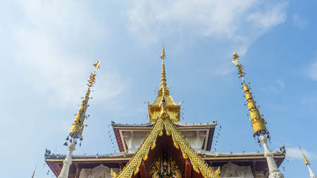 Thai temple decorated with gold and whiteの写真素材