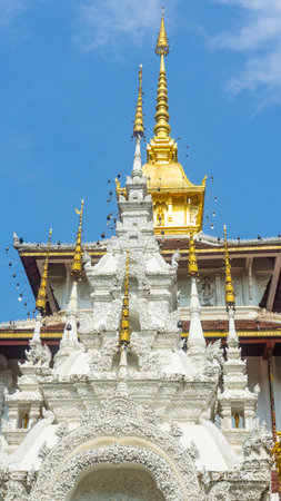 Thai temple decorated with gold and whiteの写真素材
