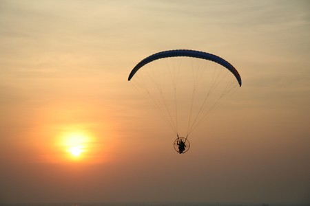 Paramotor at sunsetの写真素材