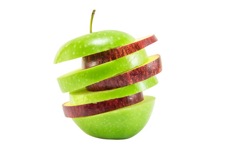 Red and green apple slice isolated on white with clipping pathの写真素材