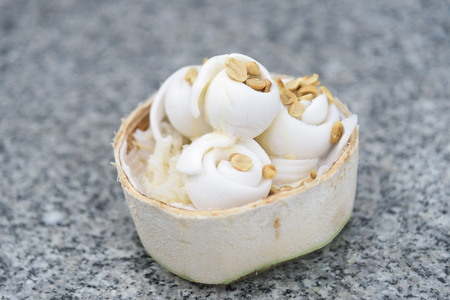 Coconut ice cream with nut in Coconut shell.の写真素材