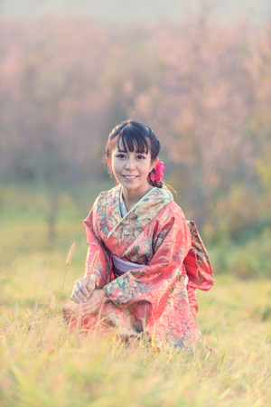 portrait of asian traditional woman with flowerの写真素材