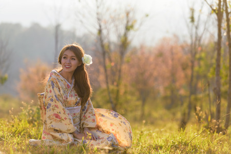 portrait of asian traditional woman with flowerの写真素材