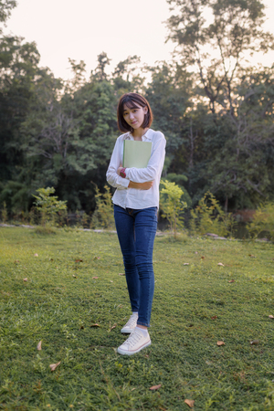 portrait beautiful caucasian college student outdoorの写真素材