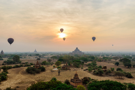 many hot air balloons above Bagan in old Bagan  Mandaly Myanmar, an ancient city with thousands of historic buddhist temples and pagodaの写真素材