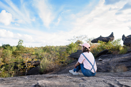 beautiful caucasian traveller with nature background, adventured girlの写真素材