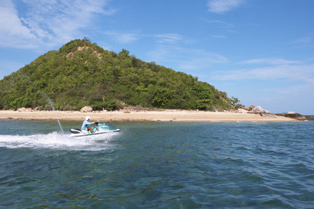 Beautiful island with jet skiの写真素材